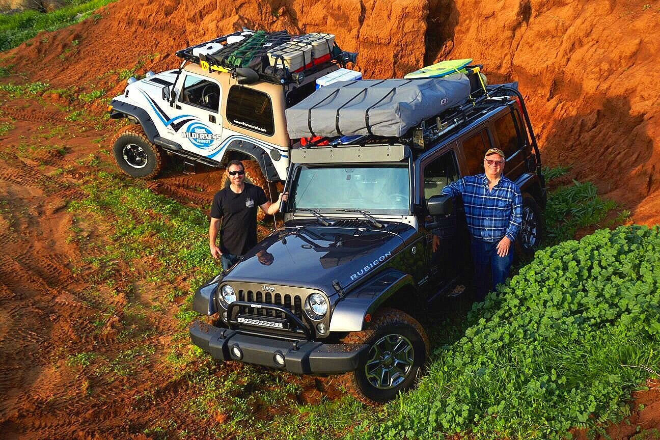 Chris and Bob Garvin Next to Jeep Wranglers with Expedition and Adventure Roof Racks