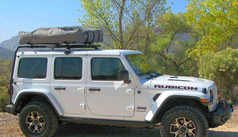 Garvin Adventure Half Rack on White Jeep Wrangler Rubicon with 20099 Adventure Half Rack and Rooftop Tent on top